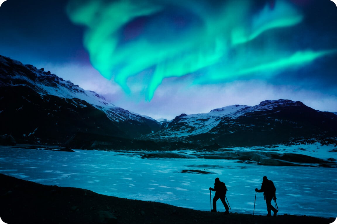 The hikers observing the Northern Lights in Iceland.