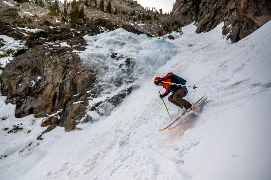 Skier bombing down a steep slope in the Teton backcountry